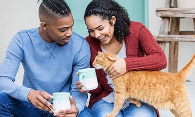 Guy and girl with kitty Guy and girl with kitty